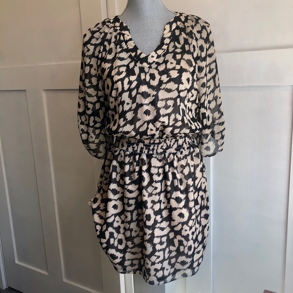 SOLD Express smocked waist cheetah print dress …